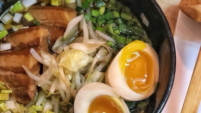 Karakatta's Taka's Shoyu ramen with clear soy broth, vegetables, and soft-boiled egg